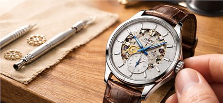 Qué es un reloj de cuerda manual?